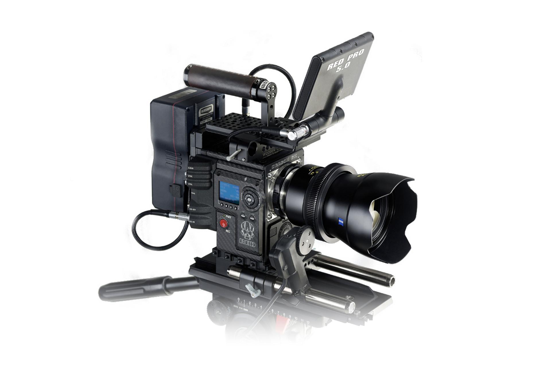 Professional cinema camera rig equipped with a ZEISS lens and various mounted accessories on a white background.