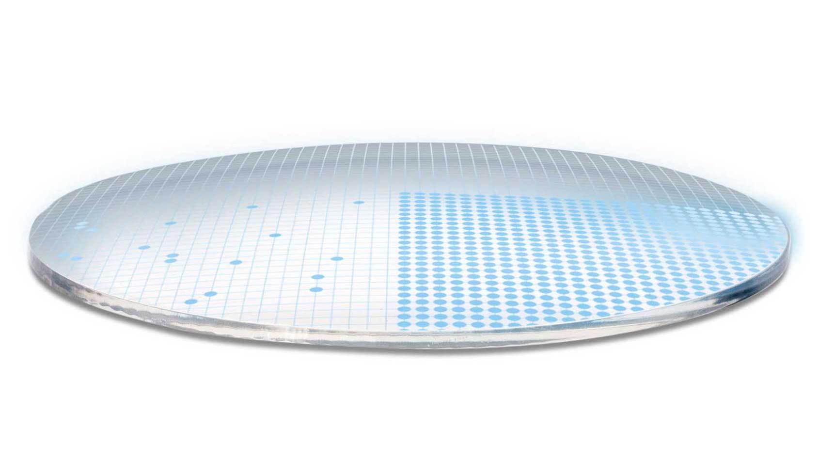 Ilustración tridimensional de una lente que muestra 700 puntos azules que representan los 700 parámetros libres para una superficie de la lente de gran complejidad.