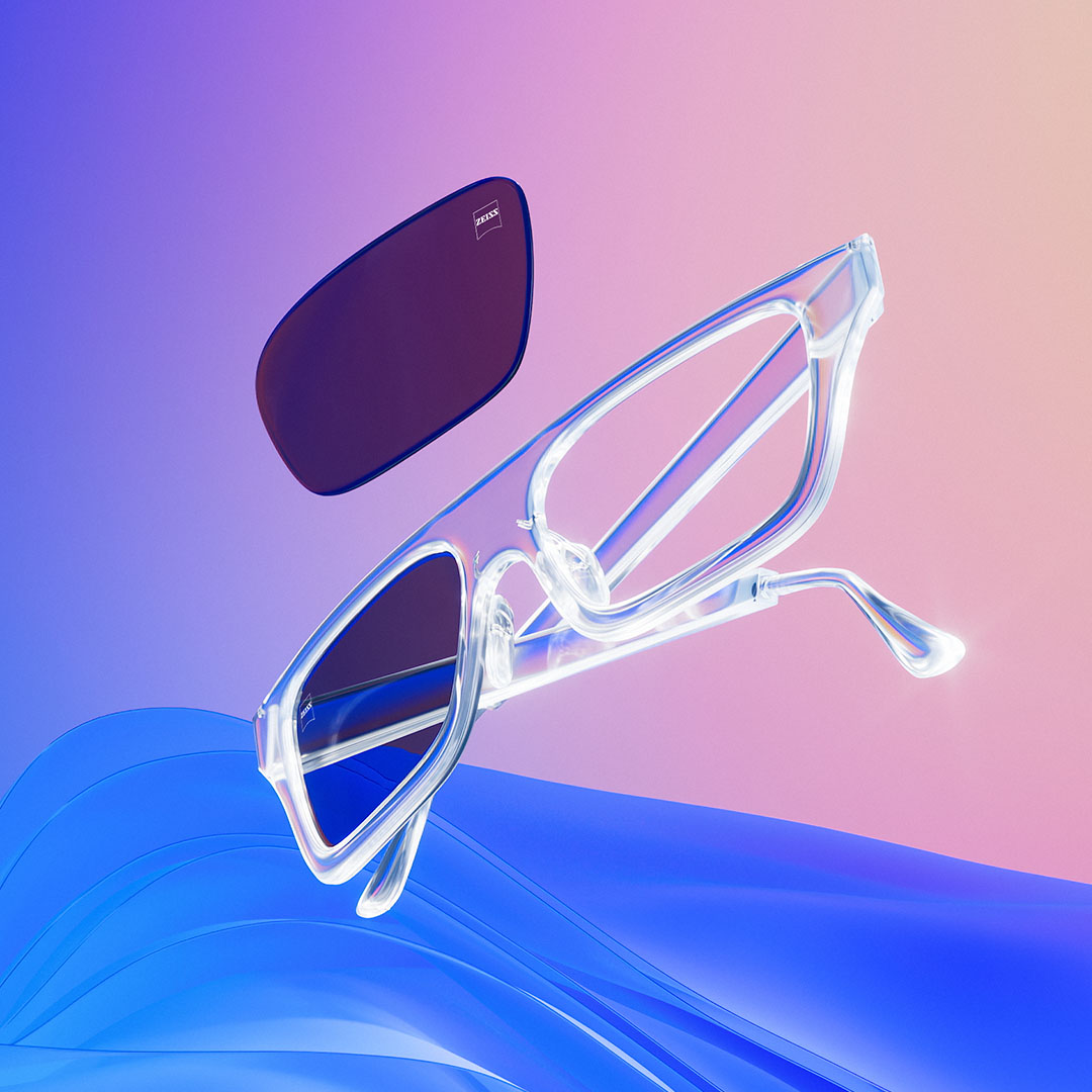 Ilustración en 3D generada por ordenador de una montura transparente con lentes tintadas.