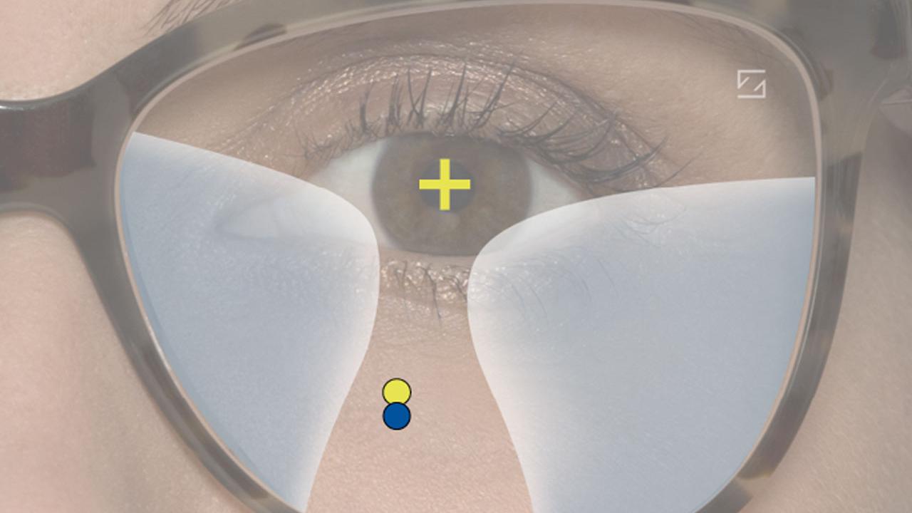 La lente progresiva optimizada le permite disfrutar de nuevo de una visión de cerca más cómoda (punto azul). 
