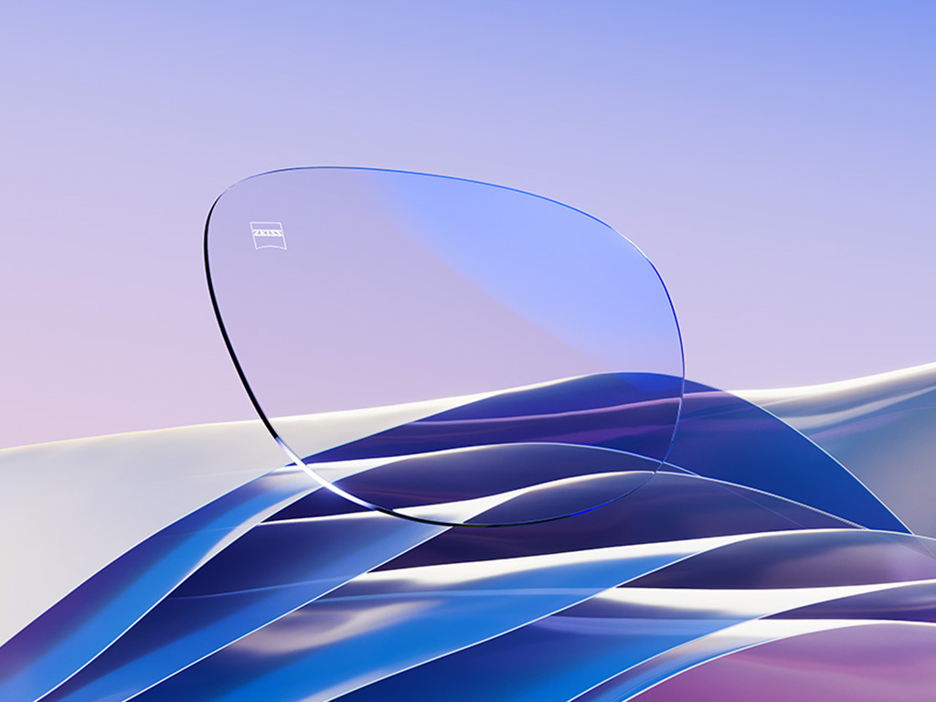 Una representación CGI de una lente transparente con un sutil reflejo azul.