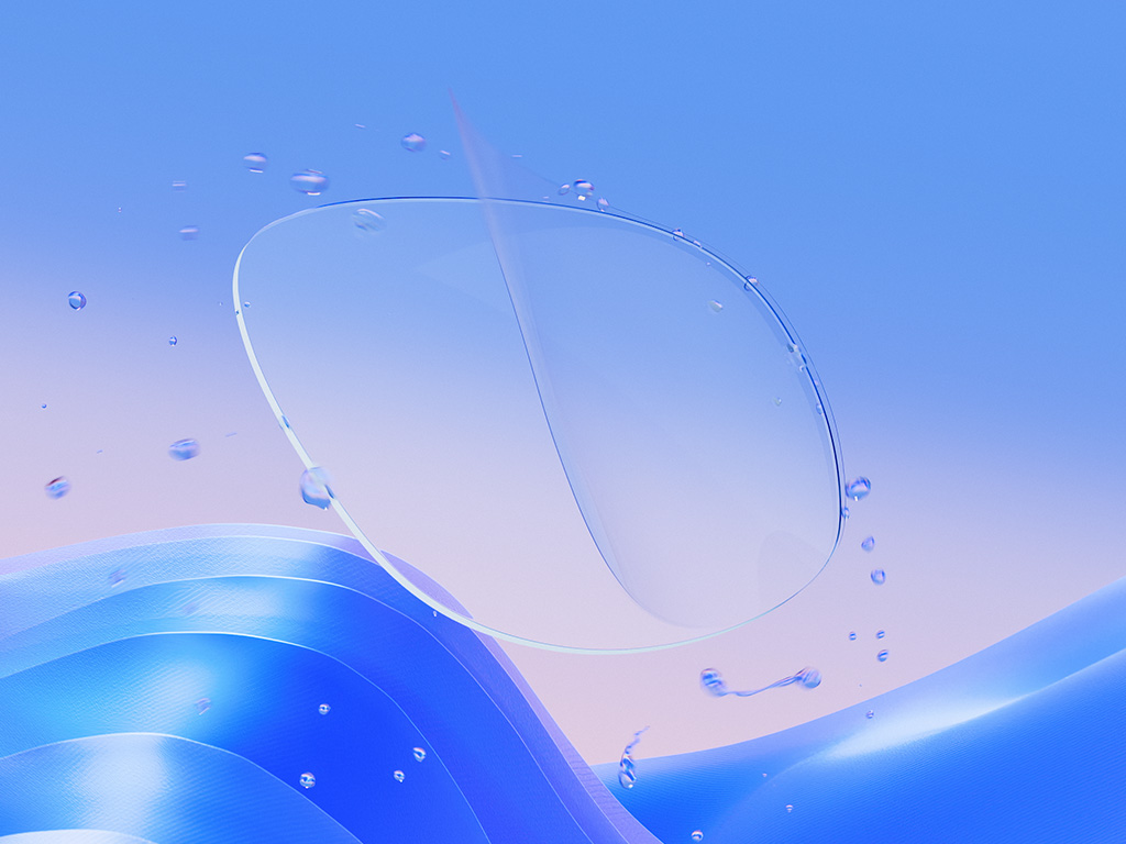Una representación CGI de una lente transparente con una fina capa de protector, que repele eficazmente las gotas de agua y muestra la claridad y las características protectoras de la lente.