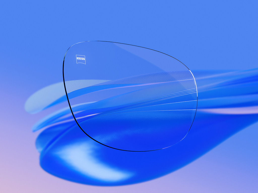 Representación 3D CGI de una lente transparente con reflejos mínimos, que destaca su excelente claridad y calidad óptica.