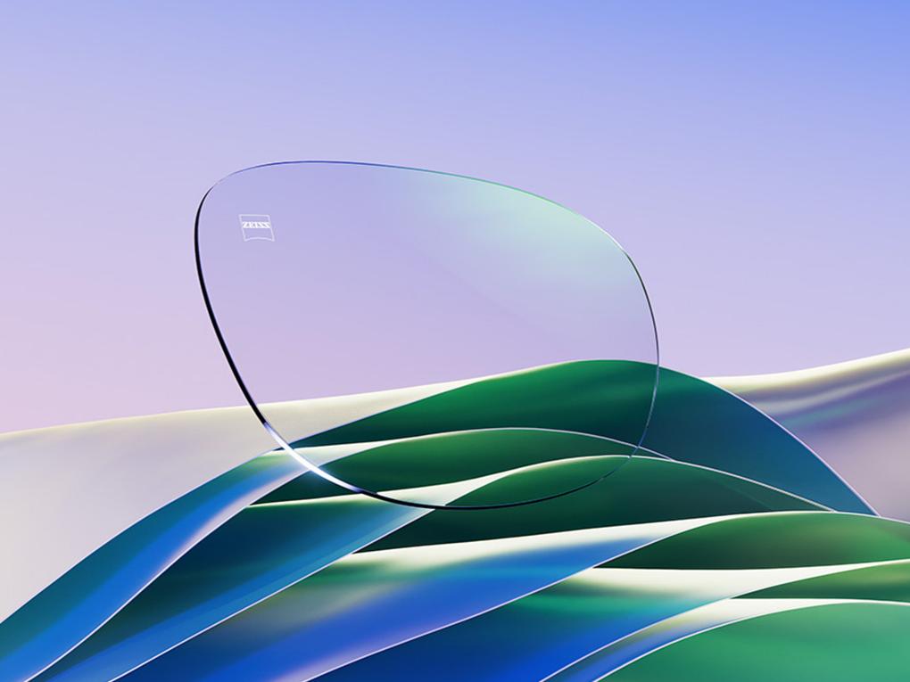 Una representación CGI de una lente transparente con un sutil reflejo verde