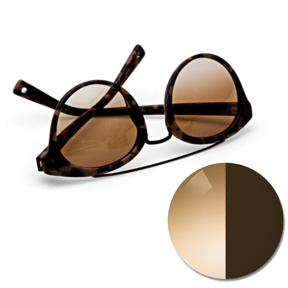 Gafas con ZEISS AdaptiveSun en marrón degradado y un punto de color en tono claro y oscuro