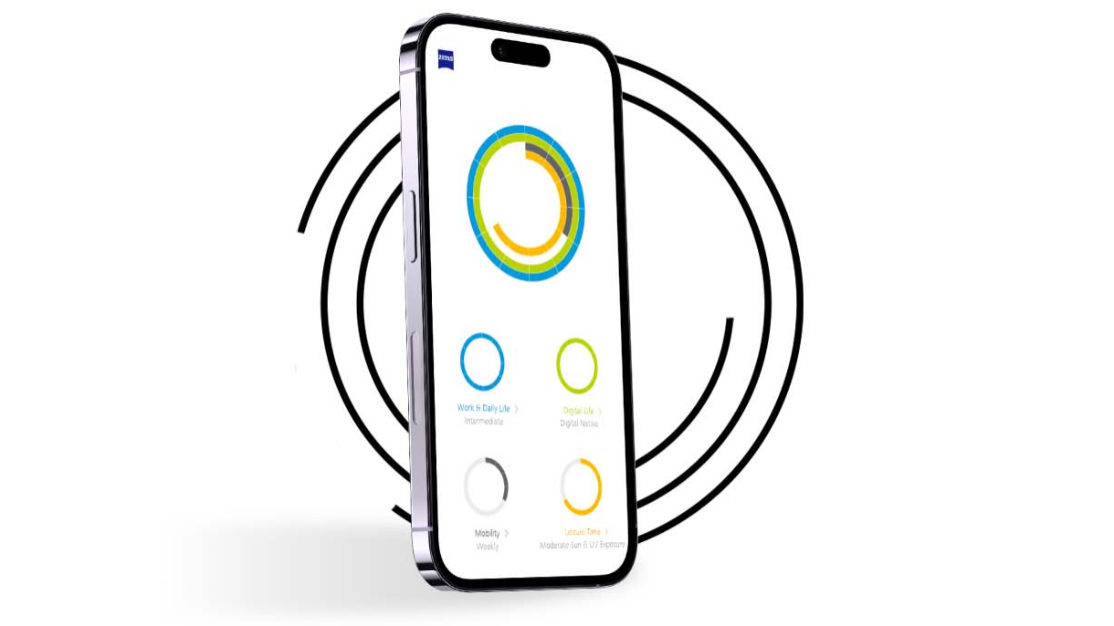 Un teléfono inteligente delante de anillos negros muestra el perfil de visión de un usuario de Mi perfil visual con anillos de distintos colores. 