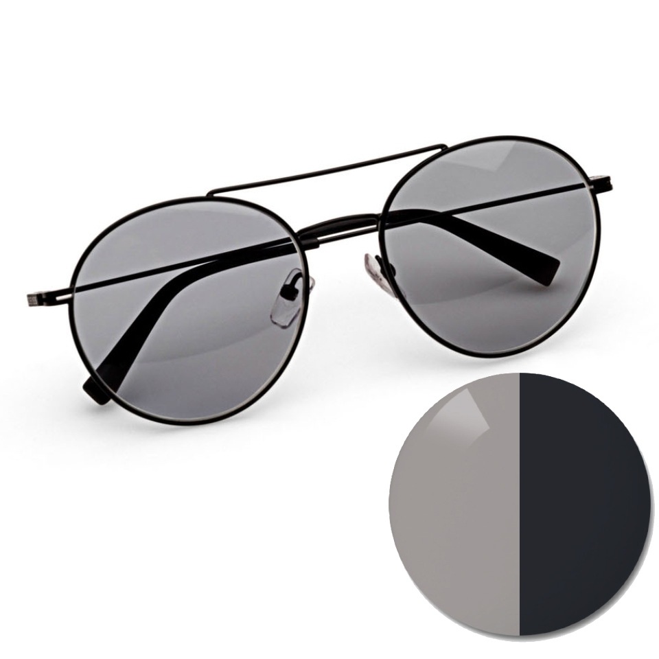 Gafas con ZEISS AdaptiveSun en gris uniforme y un punto de color en tono claro y oscuro